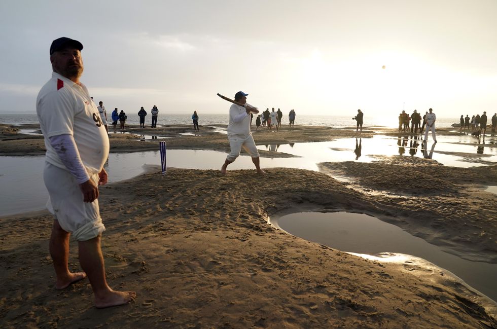 In Pictures: Waves stop play for Solent sandbar cricketers