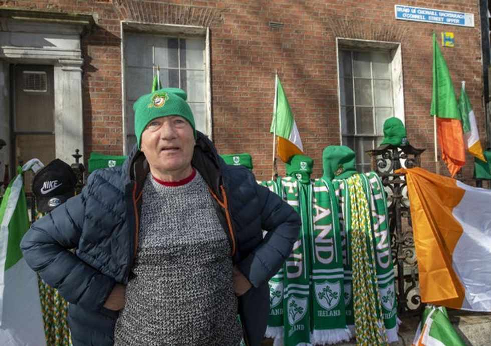 Merchandise seller Willie Egan at the St Patrick\u2019s Day Parade in Dublin