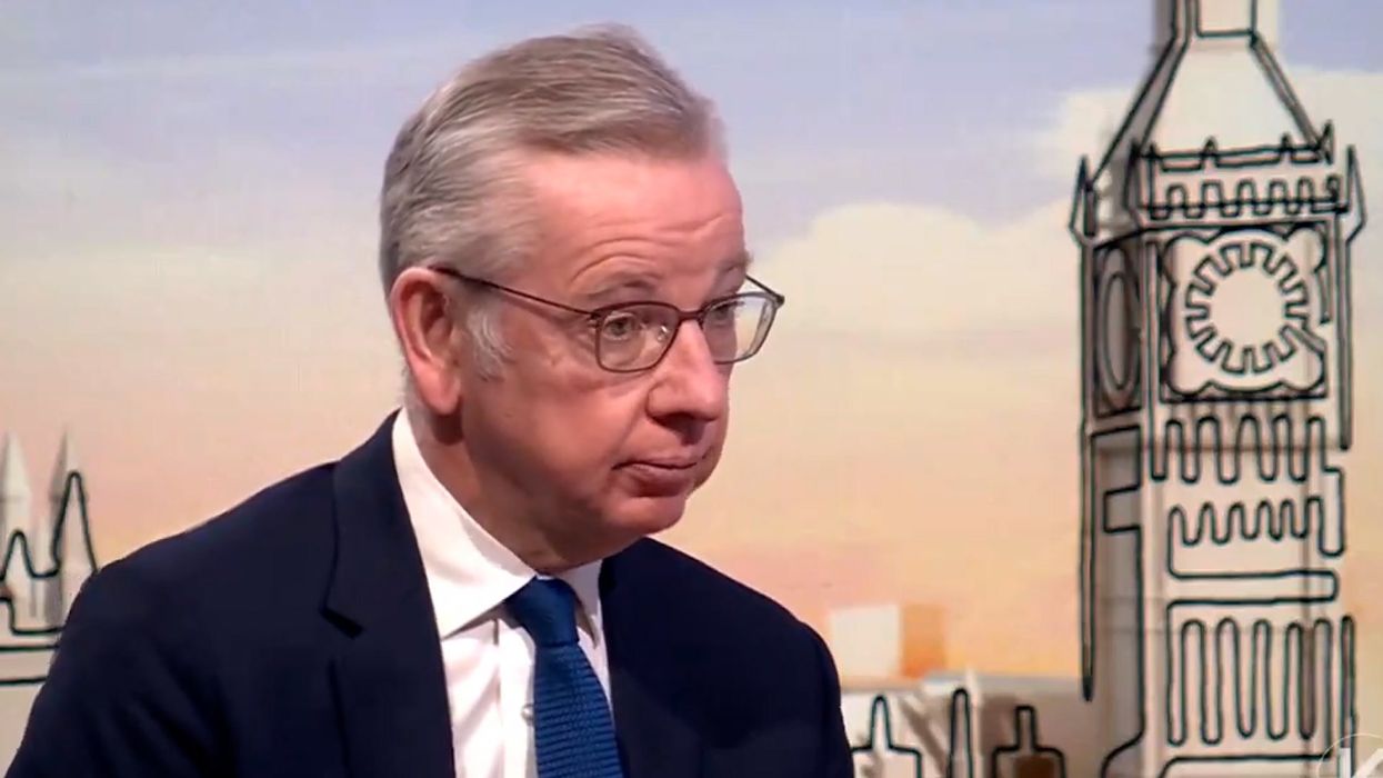 Michael Gove caught on phone during Laura Kuenssberg intro