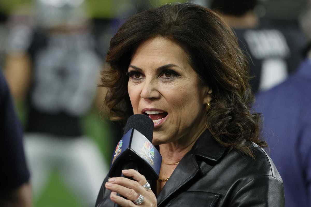Michele Tafoya, a white woman with long brown hair and a black jacket, speaking into an MSNBC-branded microphone.