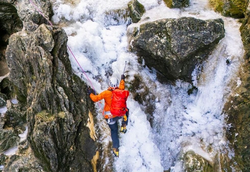 Mick Ellerton climbs a frozen waterfall in the Yorkshire Dales National Park