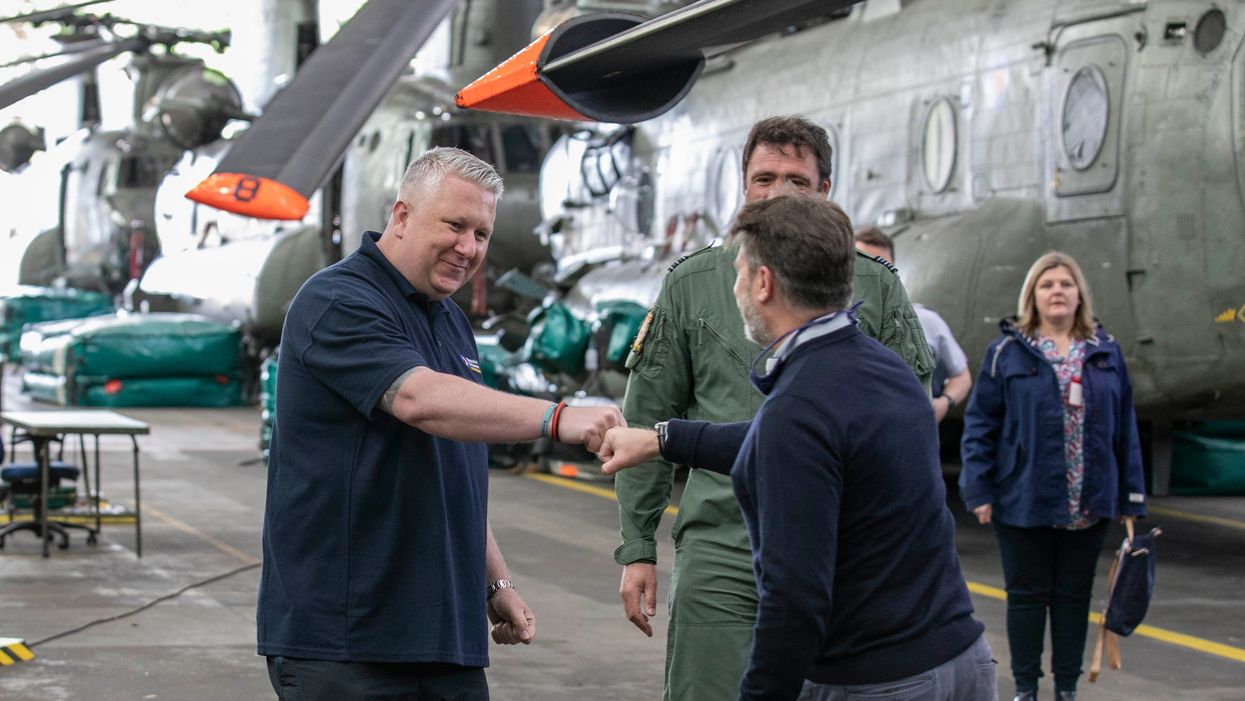 Mick McConnell, an ex RAF Police dog handler, at RAF Odiham to reunite him with the Chinook Crew that rescued him (Royal Air Force Benevolent Fund/PA)