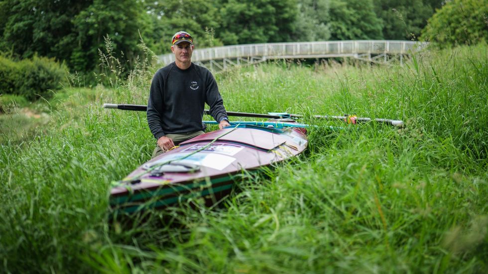 Mike Ellicock with a rowing boat