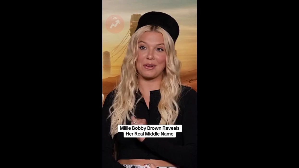 Chris Pratt shields Millie Bobby Brown on stage and stops her from being exposed in short skirt