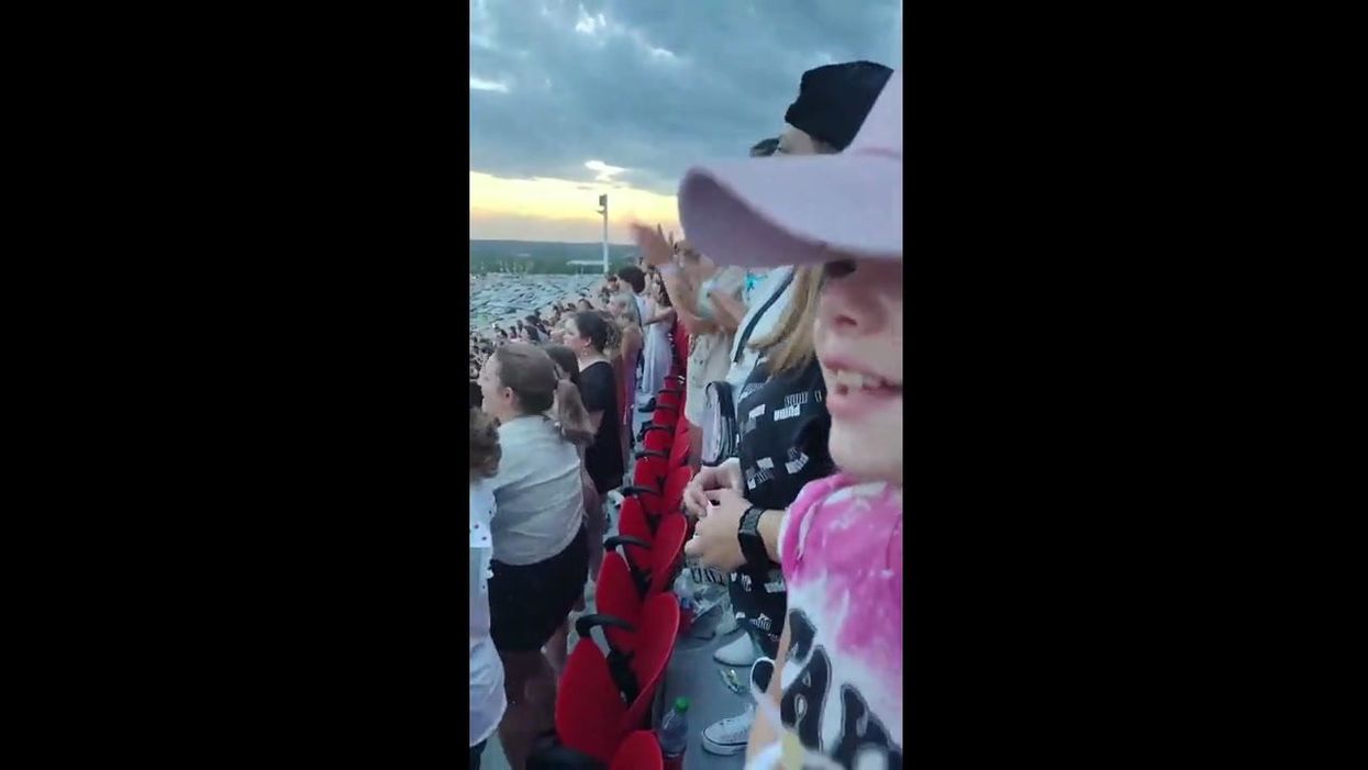 Adorable moment 'best friends' get engaged as Taylor Swift sings 'Love Story' at concert
