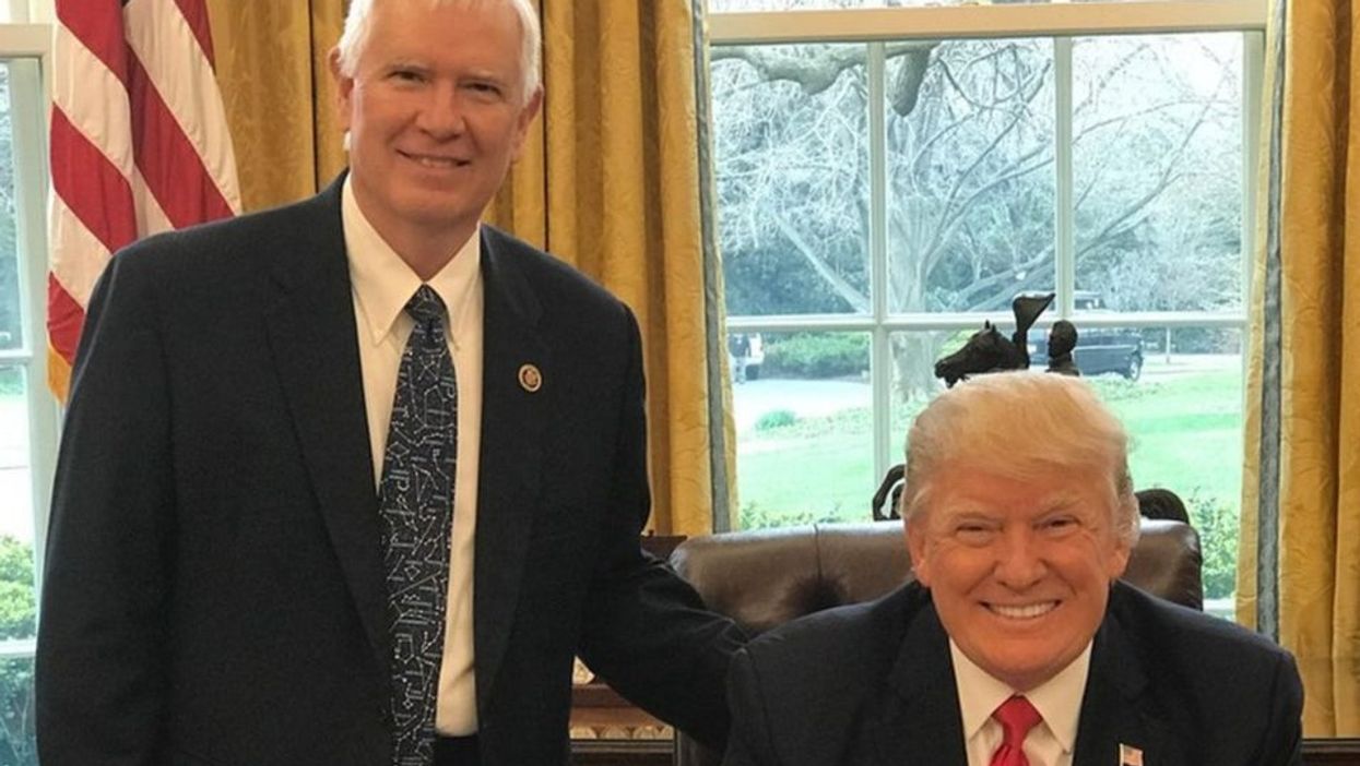 <p>Mo Brooks (left) with former president Donald Trump</p>