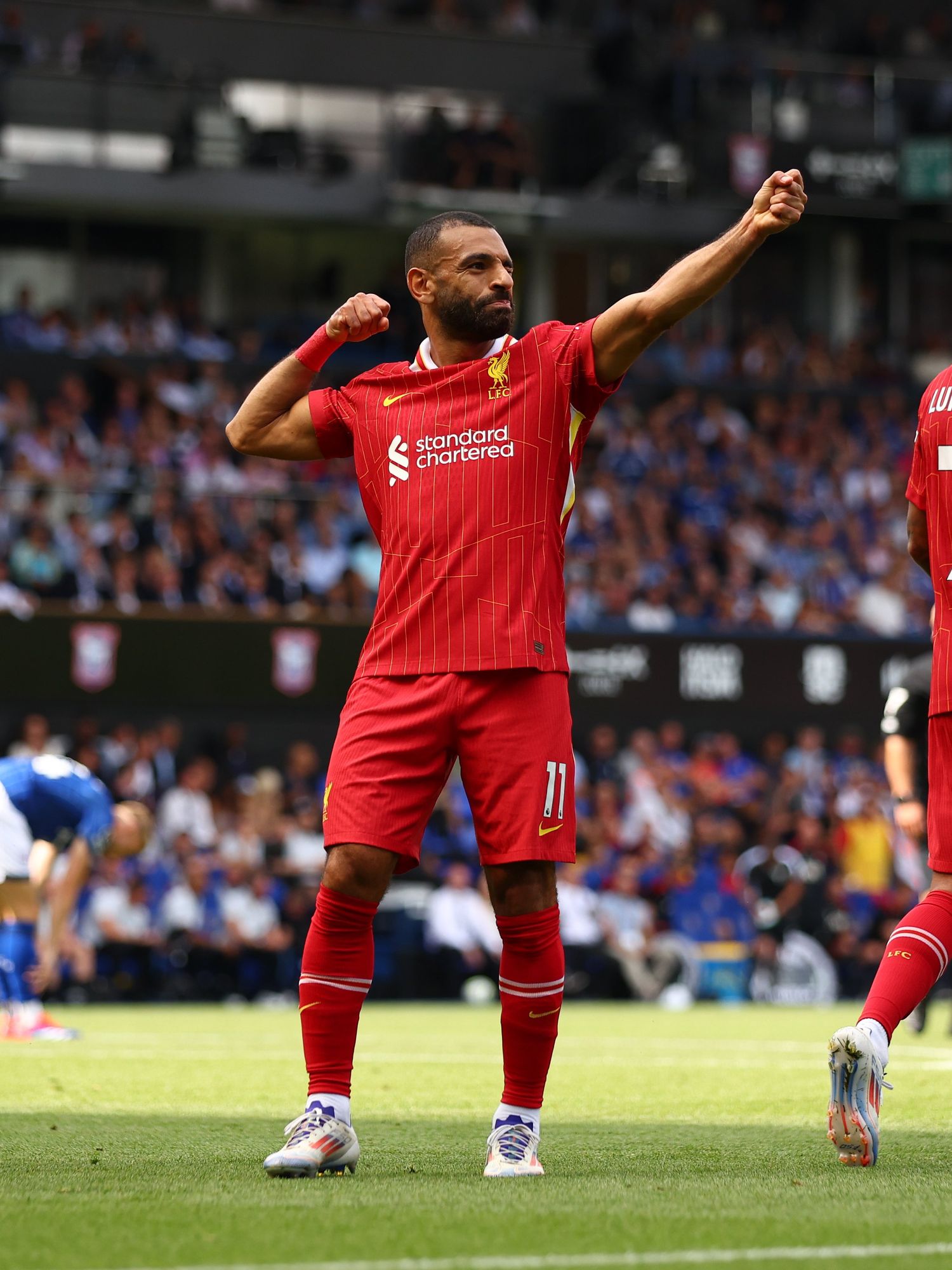 Mohamed Salah of Liverpool celebrates scoring his team's second goal with teammates Diogo Jota and Luis Diaz during the Premier League match between Ipswich Town FC and Liverpool FC at Portman Road on August 17, 2024 in Ipswich, England