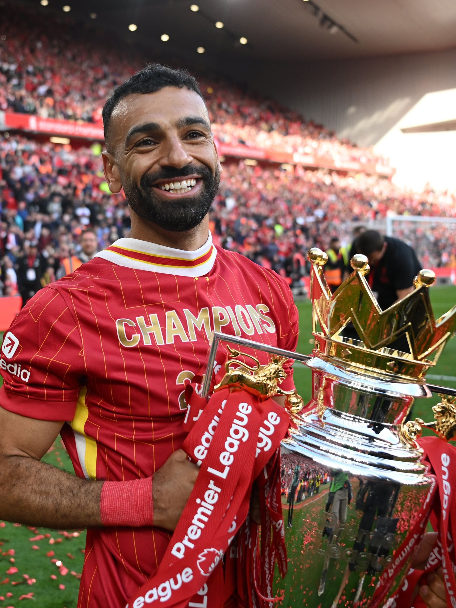 Mohamed Salah of Liverpool celebrates with the Premier League trophy trophy, as Liverpool are crowned the Champions of the Premier League for the 2024/25 Season