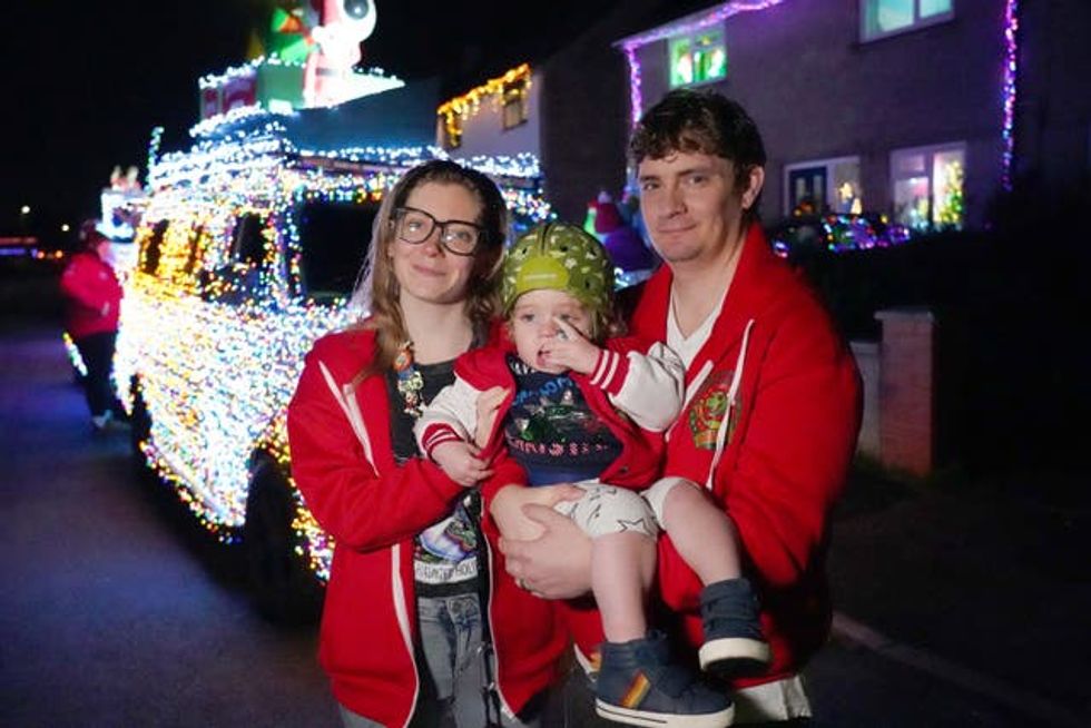 Molly and James Thorner with their son Rory outside their home