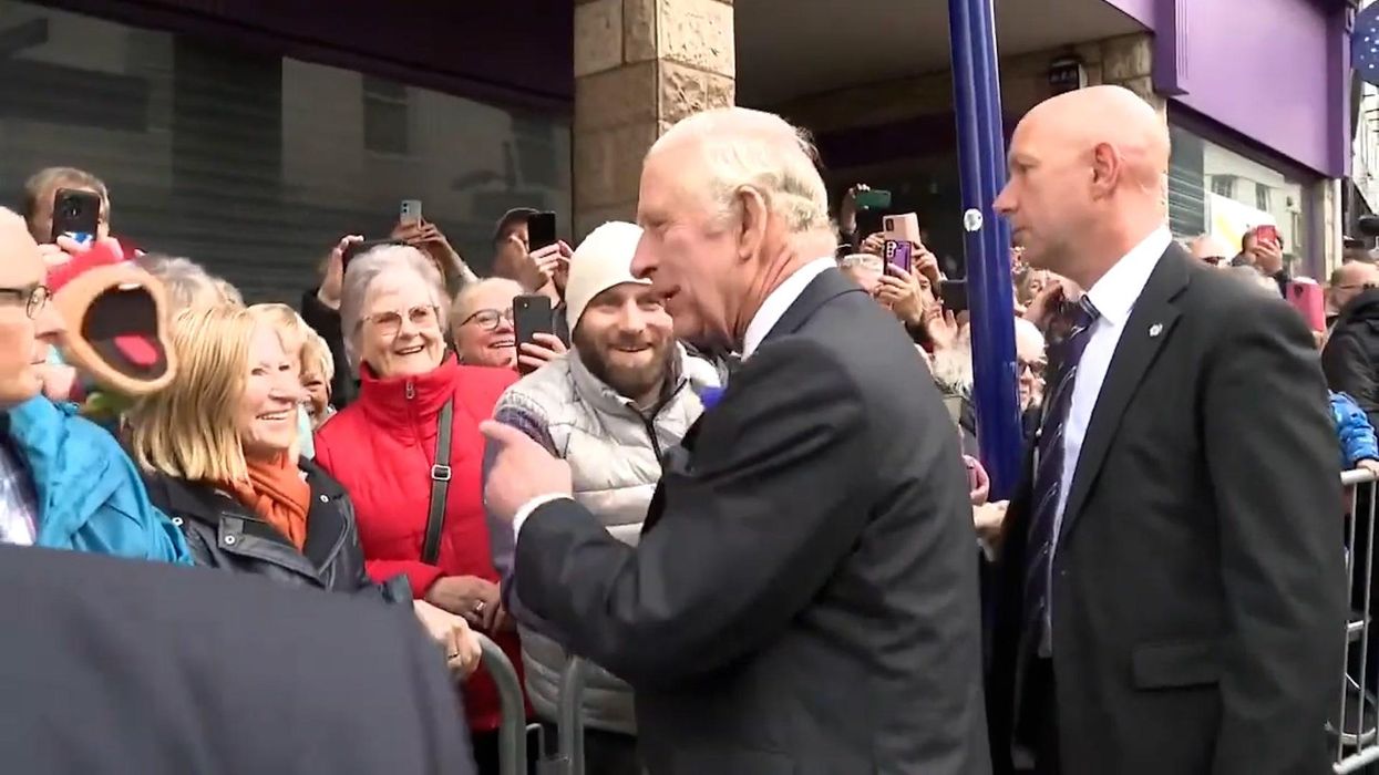 Moment barber offers King Charles a free haircut