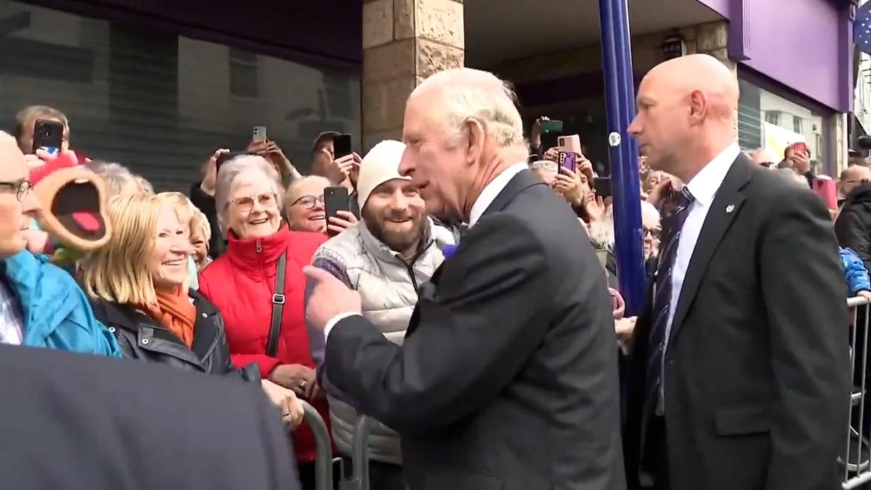 Moment barber offers King Charles a free haircut