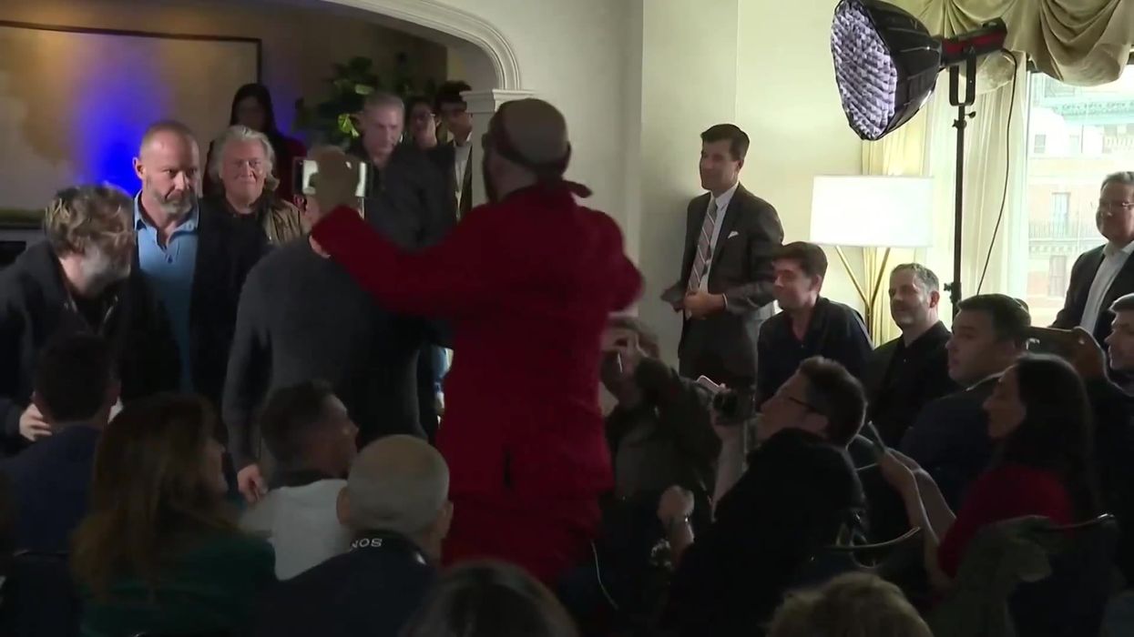 Steve Bannon press conference interrupted by heckler who asks if they can ‘storm Burger King’