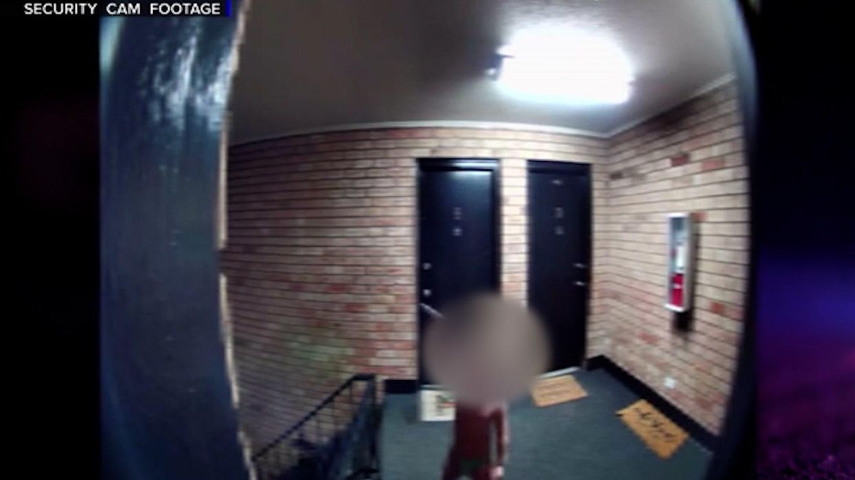 Terrifying CCTV catches toddler waving around loaded gun