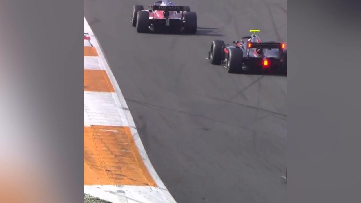 Moment unphased pigeon casually strolls through 120mph F2 race