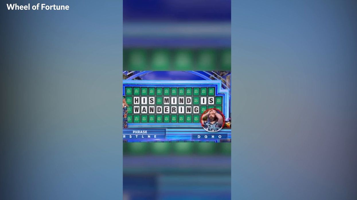 Bizarre moment sees Wheel of Fortune host wrestle with contestant