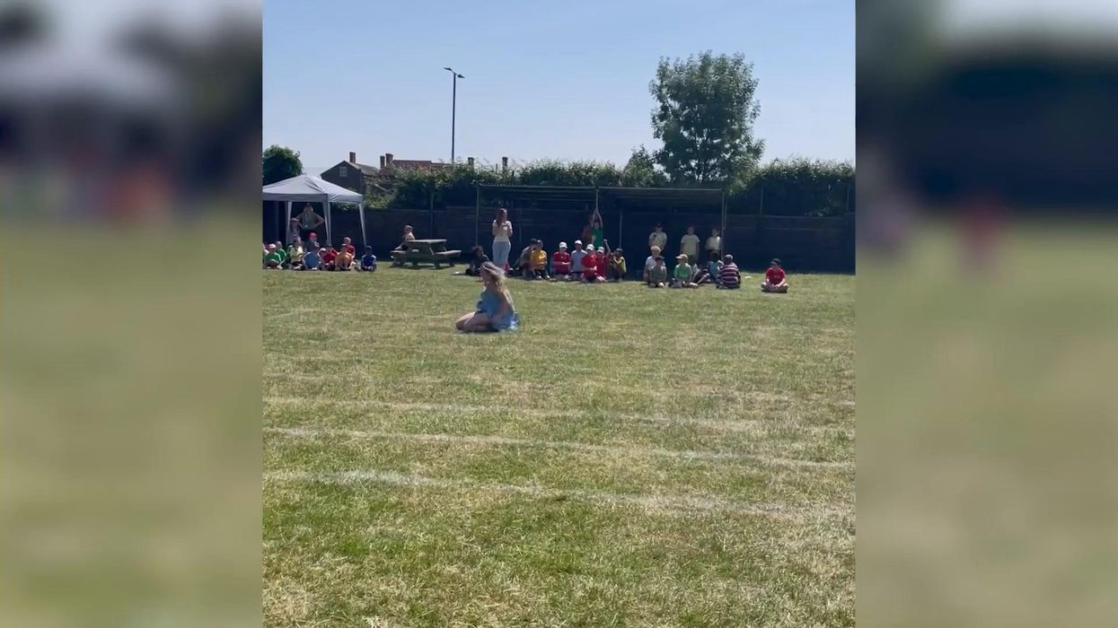 Mum who accidentally mooned her kid's entire school given a 'bottom's up' trophy