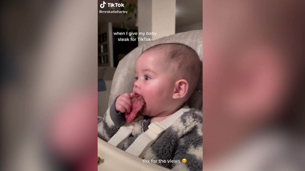 Mother sparks debate after feeding her six-month-old child a bloody steak