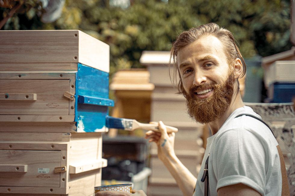 Mr Alzein said that it\u2019s \u2018really comforting\u2019 for refugees to focus on beekeeping instead of a language they might feel \u2018insecure\u2019 about speaking (Walter Finch)