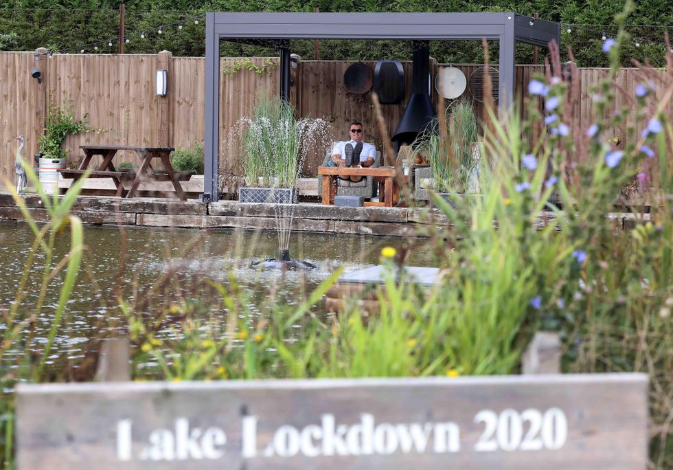 Mr Bull has hundreds of fish which have all been rehomed in his lake