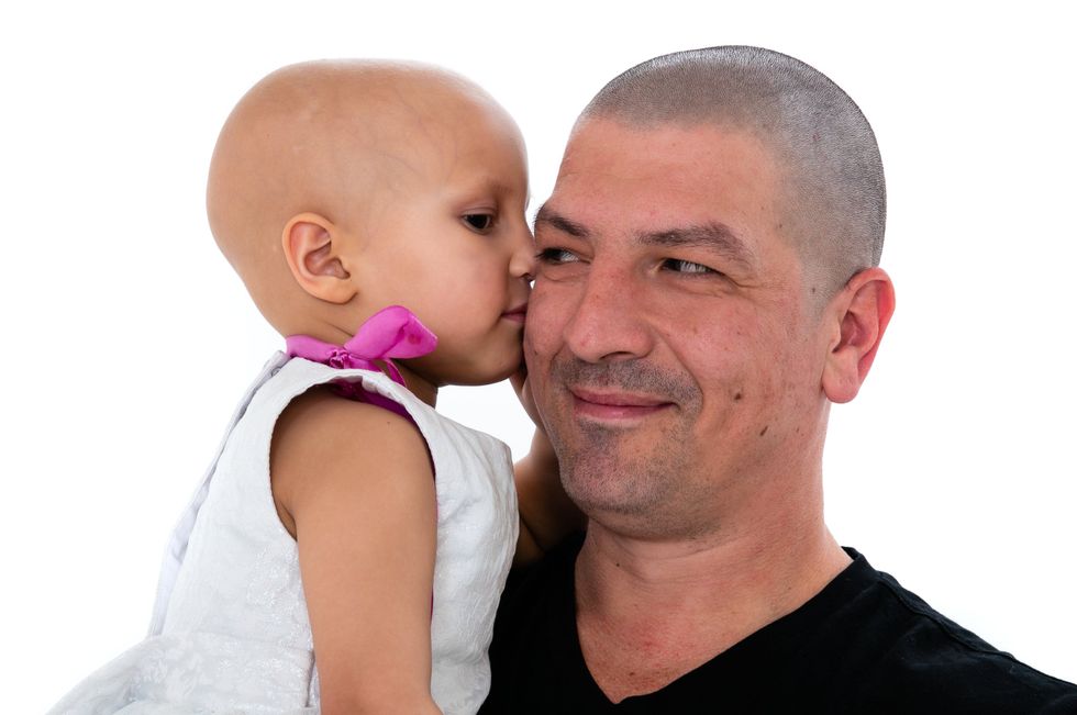 Mr Lambert said his daughter Esme is his \u201cabsolute world\u201d and has \u201csmiled her way through nearly two years of treatment\u201d. (Wendy Lambert/ PA)
