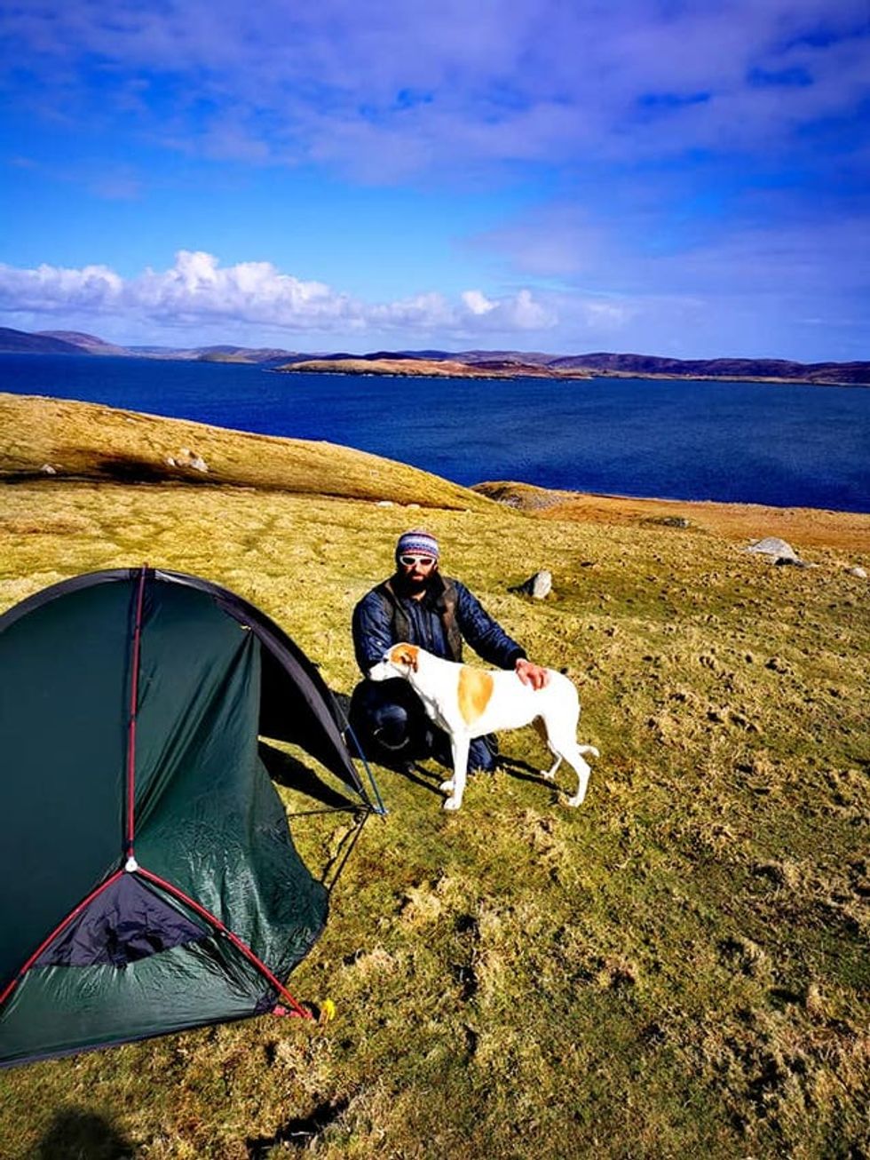 Mr Lewis and his dog Jet spent lockdown on an uninhabited Scottish island (Chris Walks the UK/PA)