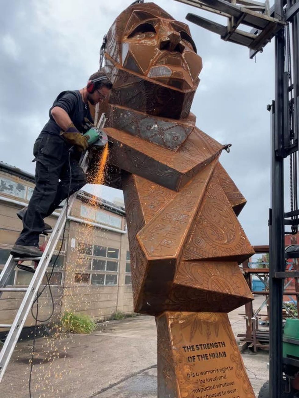 Mr Perry's work is five metres tall and weighs almost a tonne (Phil Barnett/PA)