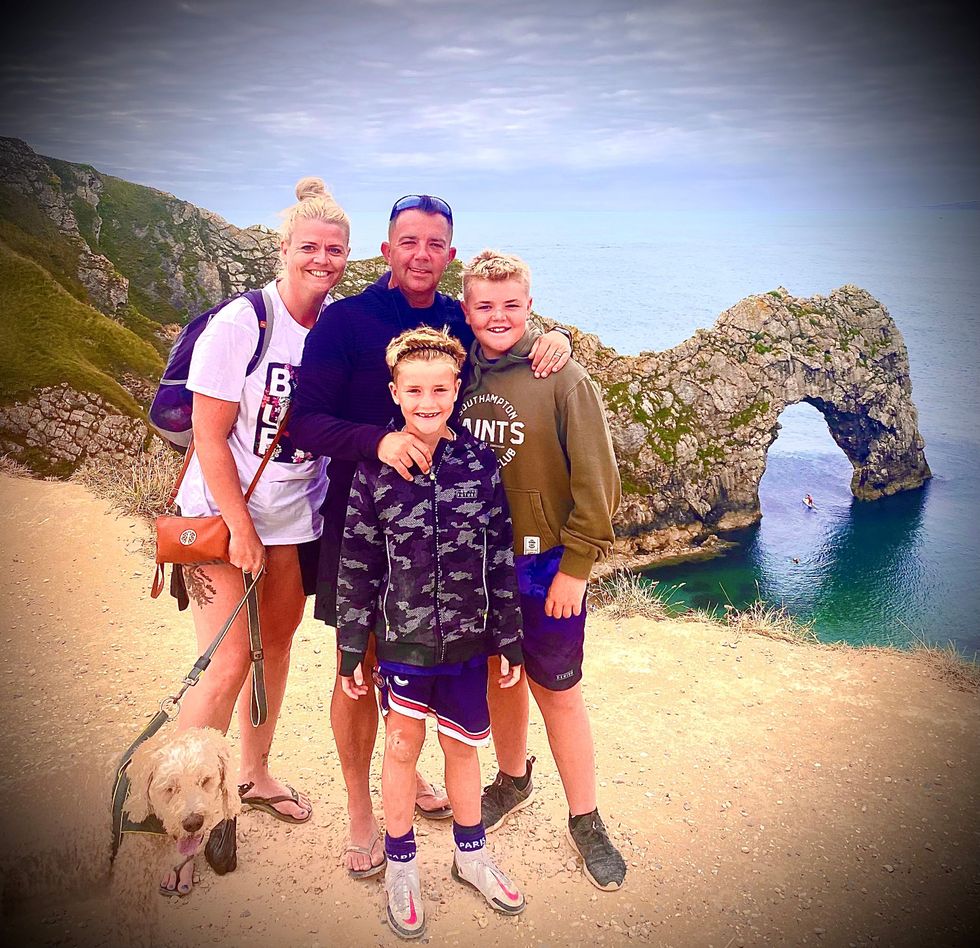 Mr Scott-Munden with his wife and sons (Simon Scott-Munden/PA).