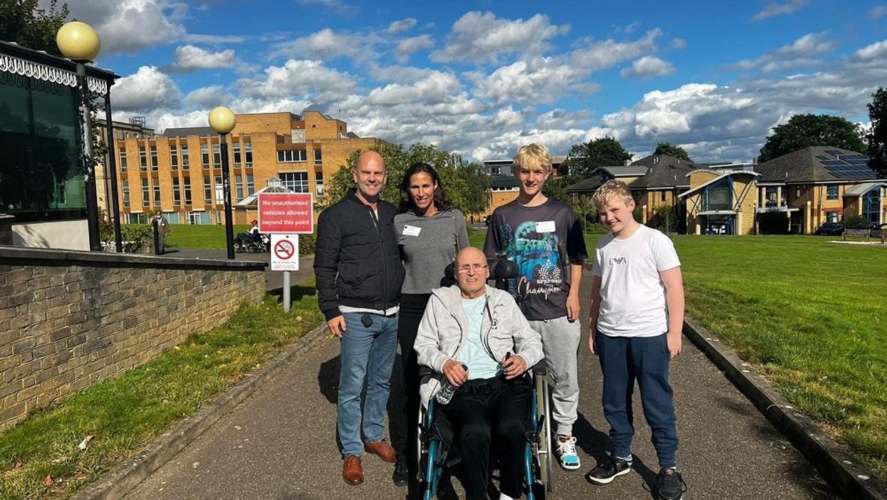 Ms Brower visiting her father in Putney with her partner, Daryl, and children, Blake, 15, and Zaine, 12 (Nadine Brower/PA).