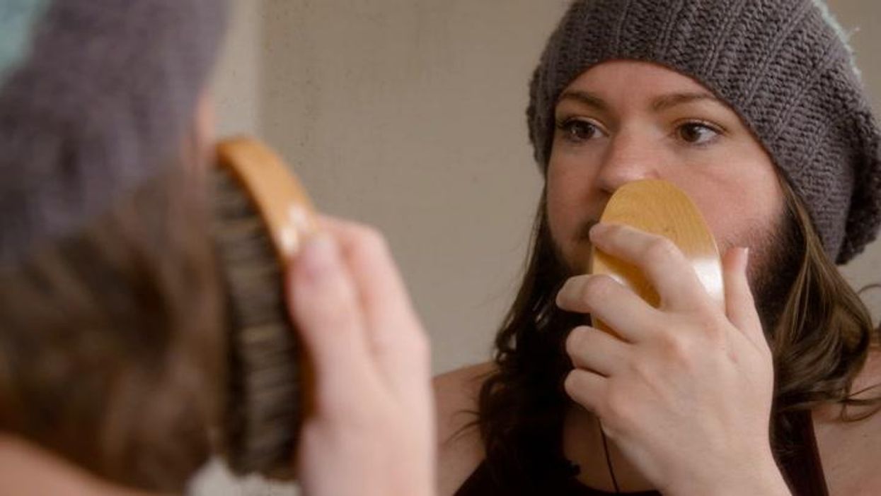 Woman decides to embrace her beard after battling hair growth condition for years