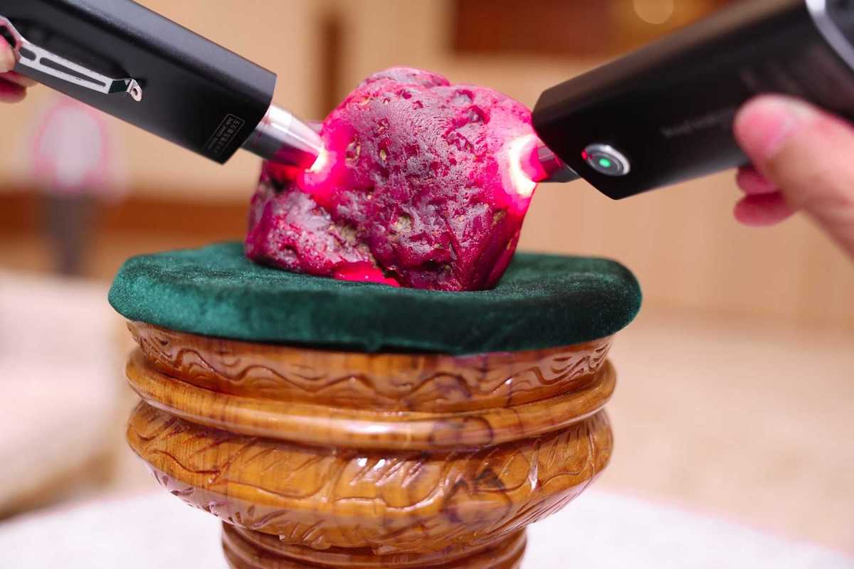 Myanmar officials inspect a newly discovered ruby