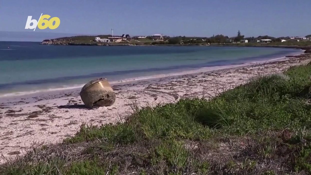 Mysterious giant object washes up on remote beach and public are urged to 'stay away'