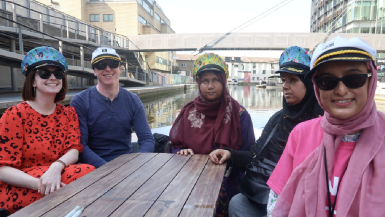 Nanjiba Misbah (middle) and other members of the RNIB on a boat trip (RNIB/GoBoat/PA)
