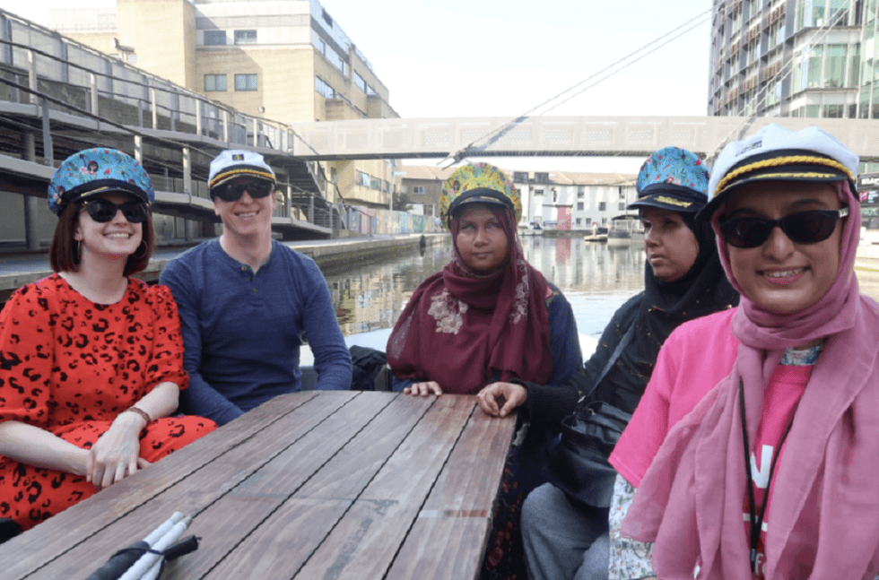 Nanjiba Misbah (middle) and other members of the RNIB on a boat trip (RNIB/GoBoat/PA)