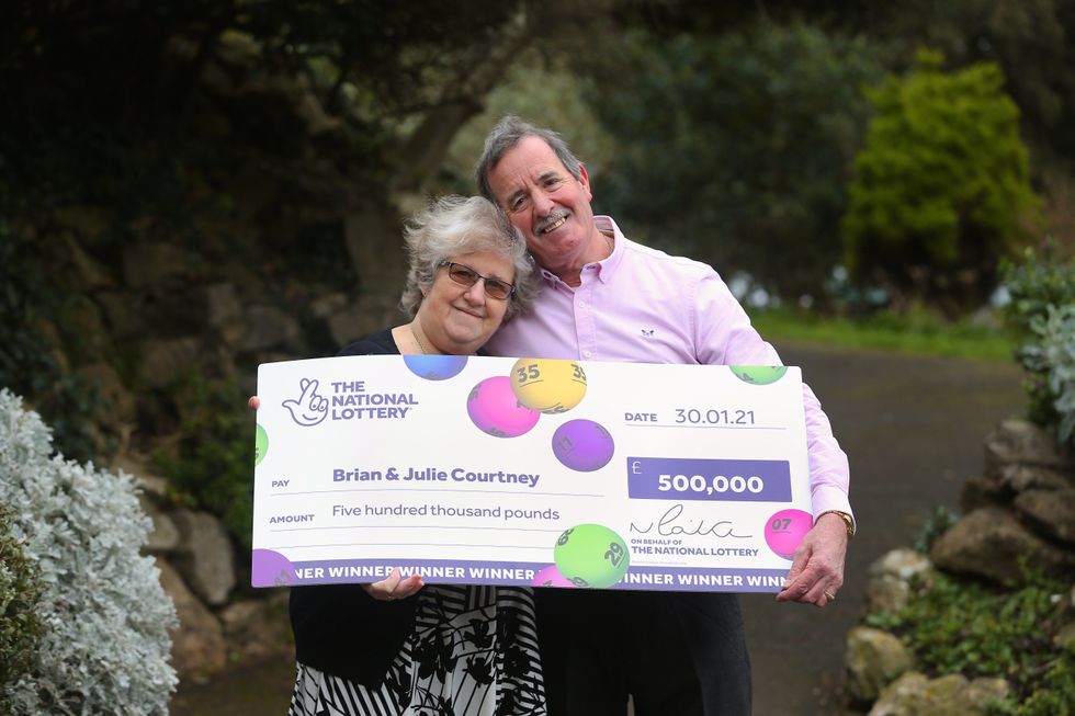 National Lottery Winners Brian and Julie Courtney of Weston Super Mare, Somerset, UK celebrate their \u00a3500,000 win
