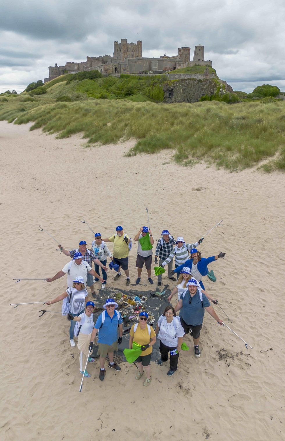 Lottery winners join beach clean-up to ‘give something back’