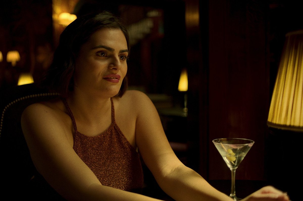 Nava Mau, a Mexican woman with long black hair and a brown dress, in Baby Reindeer.