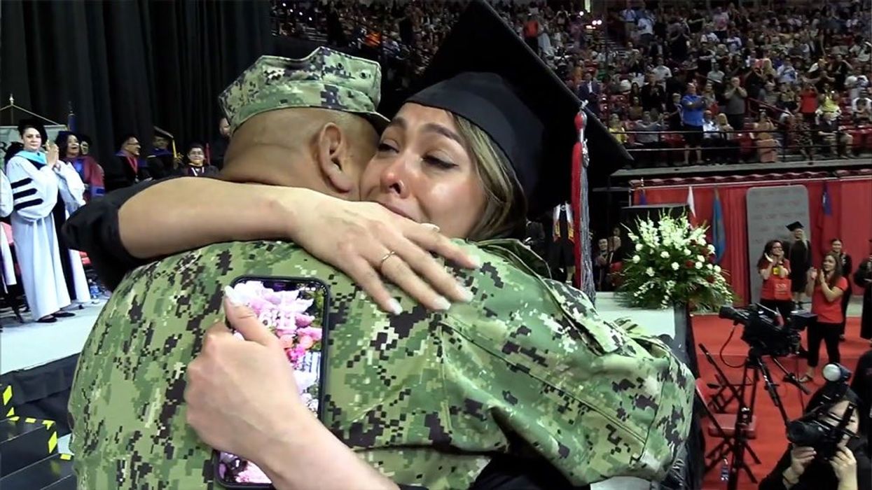 Navy officer travels over 30 hours to surprise daughter at graduation ceremony