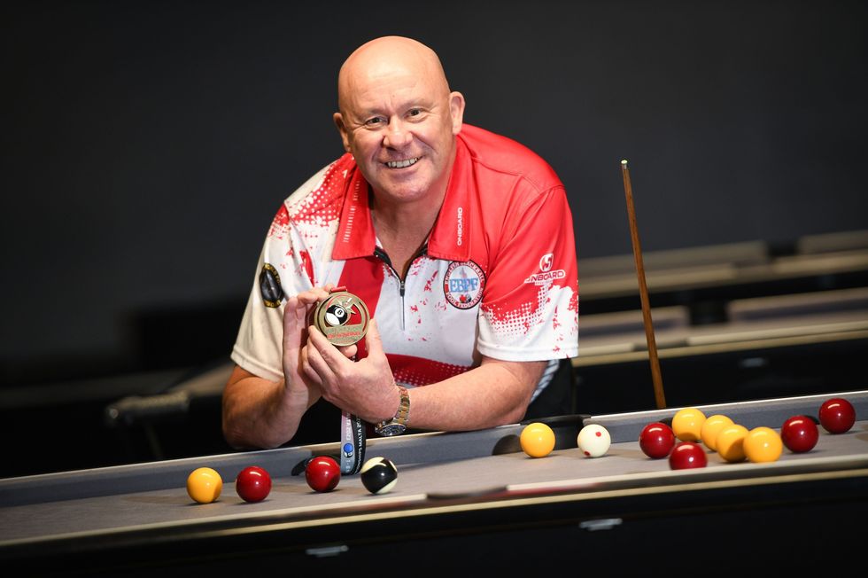 Lottery winner who bought pool table before representing England wins bronze