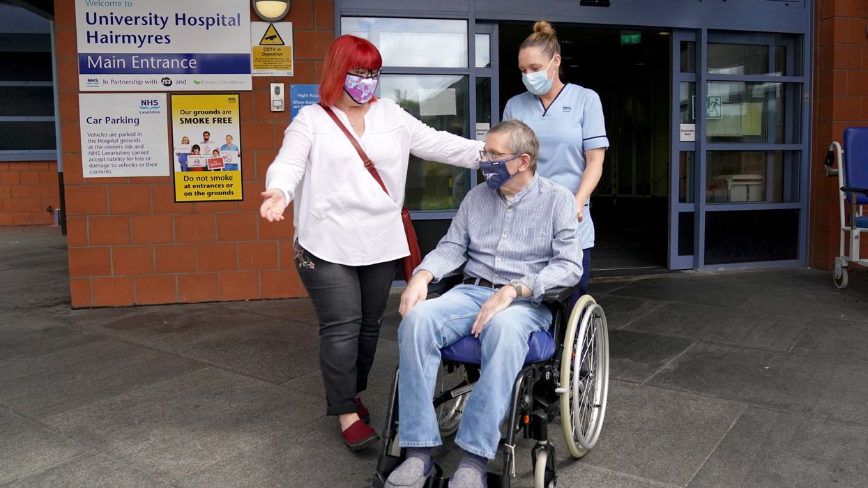 Neil McLaughlin leaving hospital