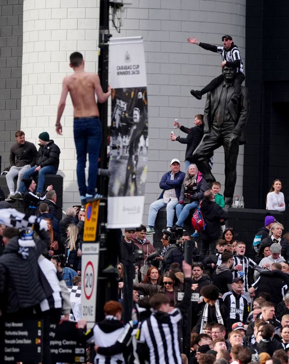 Newcastle United fans outside St James\u2019 Park, ahead of the Carabao Cup trophy parade in Newcastle