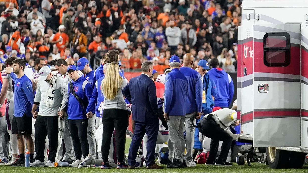 Why did Damar Hamlin go into cardiac arrest during Monday night's NFL game?