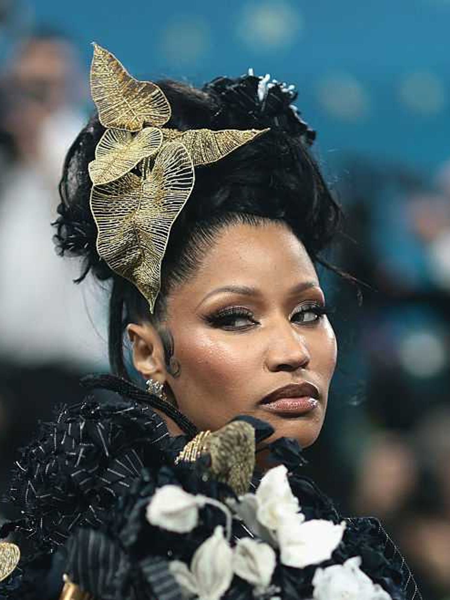 Nicki Minaj at the 2025 Met Gala, with a serious facial expression as she looks slightly over her right shouler.