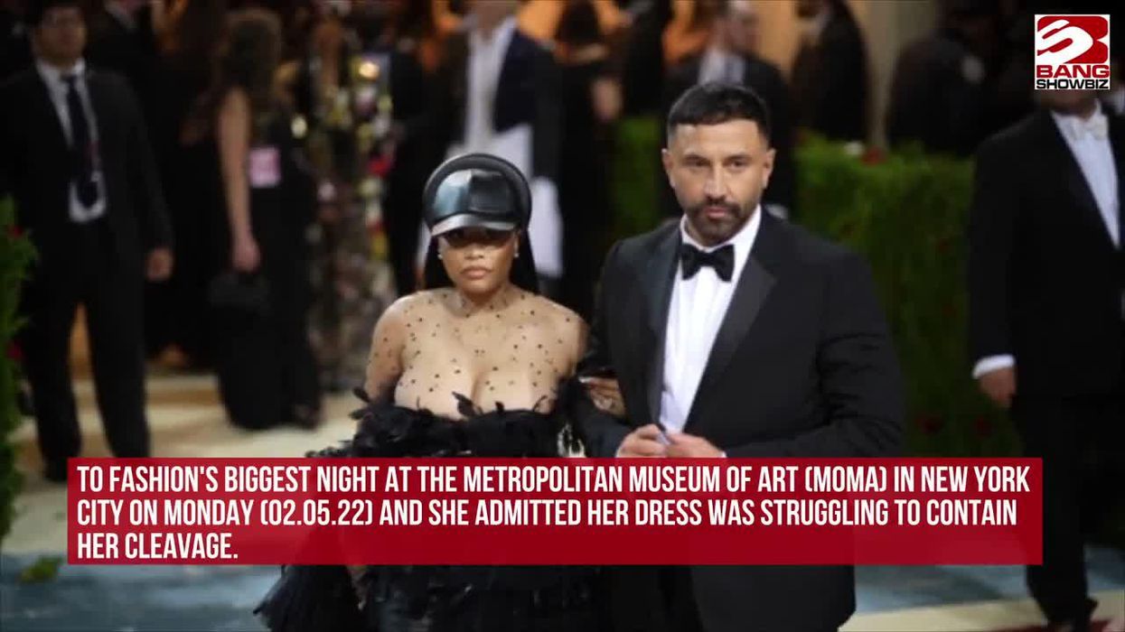 Nicki Minaj's Breast Slipped Out Of Her Dress(photos And Video
