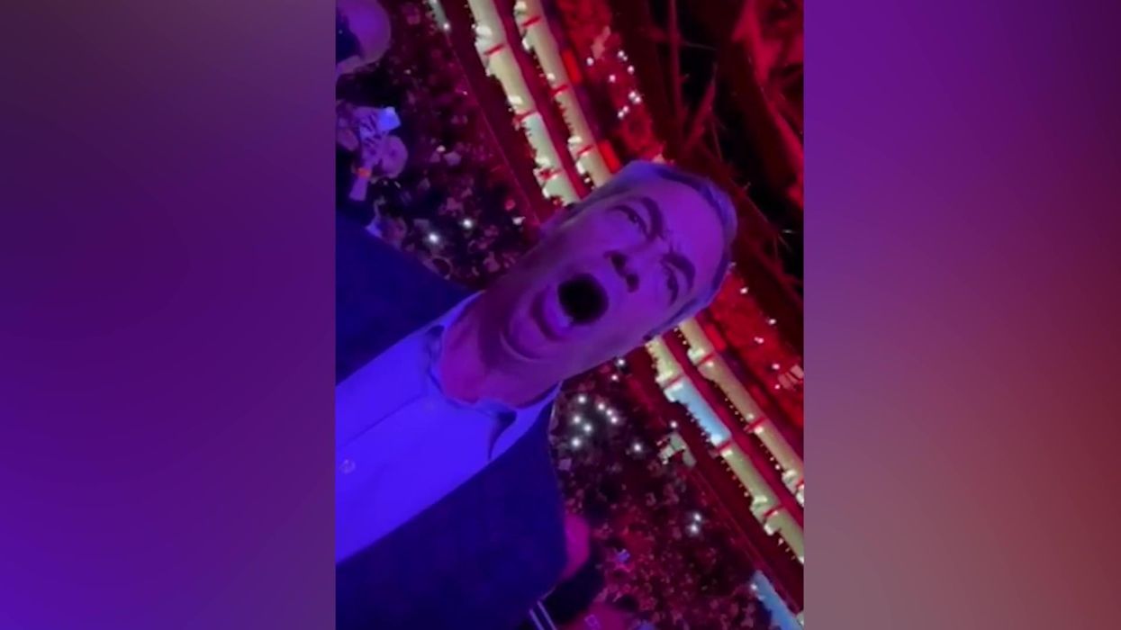 Nigel Farage sang the national anthem as passionately as ever at the KSI fight