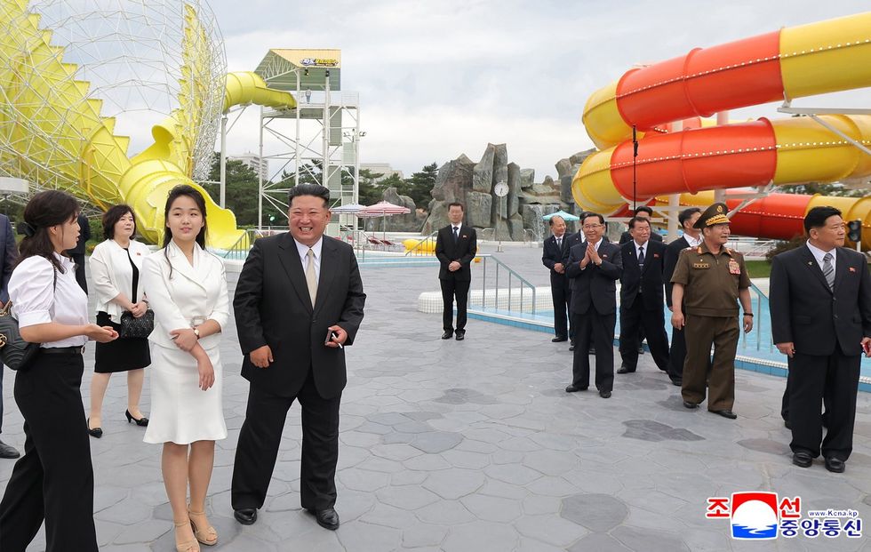 North Korean leader Kim Jong Un (4-L) and his daughter Kim Ju Ae (3-L) during a ceremony marking the opening of the Wonsan Kalma Coastal Tourist Zone in Wonsan, North Korea, 24 June 2025