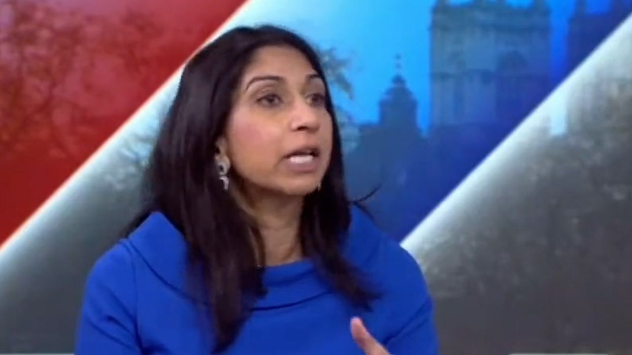 Suella Braverman reacts after being told refugee protesters were shot dead in Rwanda in 2018