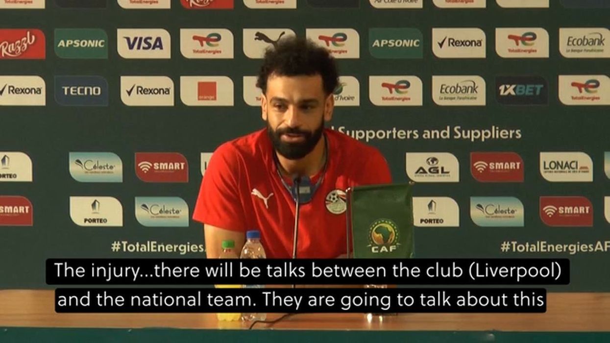 Liverpool fans reeling as Mo Salah poses with his name on another club's shirt