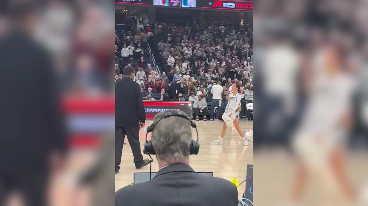 Basketball star appears to touch cheerleader's breast in viral video sparking a debate