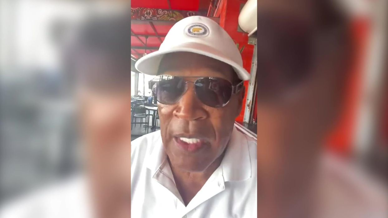 Video shows OJ Simpson being woken up in bed by young women and people have concerns