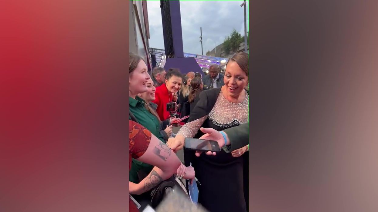Olivia Colman impressed by fan's tattoo of her face on red carpet